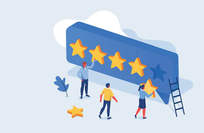 feature online rep Illustration of stars being put on a billboard to represent online reputation management